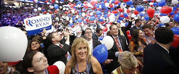 Balloons fall as Republican presidential nominee Mitt Romney and Republican vice presidential nominee, Rep. Paul Ryan's families take the stage at the Republican National Convention in Tampa, Fla., on Thursday, Aug. 30, 2012. (AP Photo/Jae C. Hong)