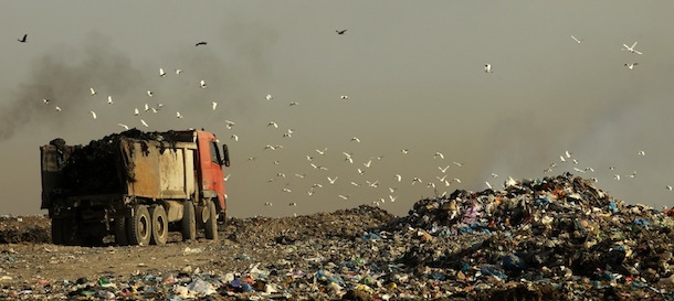 Birds fly over a rubbish dump east of Gaza City, near the Israeli border with the Gaza Strip, on April 3, 2013. AFP PHOTO/MOHAMMED ABED (Photo credit should read MOHAMMED ABED/AFP/Getty Images)