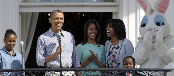 President Barack Obama, accompanied by first lady Michelle Obama, daughters Sasha and Malia, The Easter Bunny and Robby Novak, better known as Kid President, speaks to the crowd on the South Lawn from the Truman Balcony of the White House in Washington, Monday, April 1, 2013, during the annual Easter Egg Roll. (AP Photo/Susan Walsh)