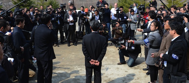 Paek Chang-Ho, director of the satellite control centre in North Korea speaks to journalists outside the satellite control room of the space center on the outskirts of Pyongyang on April 11, 2012. North Korea said that the fuelling of a long-range rocket is under way, ahead of the launch scheduled for later this week despite international protests."We are injecting fuel as we speak. It has started" Paek Chang-Ho, director of the satellite control centre told visiting foreign journalists. North Korea is counting down to the 100th anniversary of its founder's birth Kim Il-Sung on April 15 with top-level meetings and a controversial rocket launch scheduled in coming days to bolster his grandson's credentials. AFP PHOTO/PEDRO UGARTE (Photo credit should read PEDRO UGARTE/AFP/Getty Images)