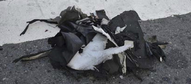 This image from a Federal Bureau of Investigation and Department of Homeland Security joint bulletin issued to law enforcement and obtained by The Associated Press, shows the remains of a black backpack that the FBI says contained one of the bombs that exploded during the Boston Marathon. The FBI says it has evidence that indicates one of the bombs that exploded in the Boston Marathon was contained in a pressure cooker with nails and ball bearings, and it was hidden in a backpack. (AP Photo/FBI)