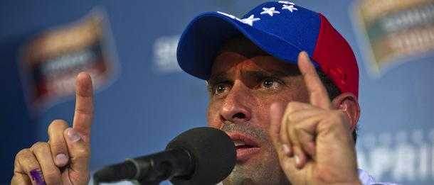 Venezuelan presidential election runner-up Henrique Capriles speaks during a press conference in Caracas, on April 16, 2013. Capriles urged the government Tuesday to open a dialogue with him after the disputed vote sparked protests that turned deadly. AFP PHOTO/RONALDO SCHEMIDT (Photo credit should read Ronaldo Schemidt/AFP/Getty Images)