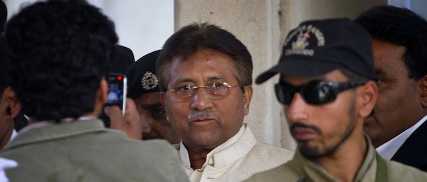 Pakistan's former president and military ruler Pervez Musharraf, center, leaves after appearing in court in Rawalpindi, Pakistan on Wednesday, April 17, 2013. Musharraf appeared in court to seek bail in Benazir Bhutto's assassination case. Pakistan's Supreme Court ordered Musharraf to respond to allegations that he committed treason while in power, and barred him from leaving the country only weeks after he returned. (AP Photo/Anjum Naveed)