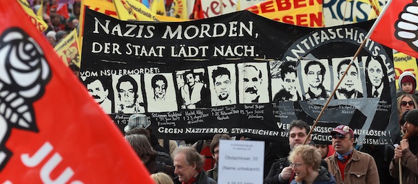 Activists protesting against right-wing violence demonstrate in the city center five days ahead of the beginning of the NSU murder trial on April 13, 2013 in Munich, Germany. The main defendant in the trial is Beate Zschaepe, who lived for years together with Uwe Mundlos and Uwe Boehnhardt, the two men who in a cartoon video DVD took responsibility for the murder of nine immigrants and one policewoman over an eight-year period and claimed to belong to an organization calling itself the National Socialist Underground, or NSU. Mundlos and Boehnhardt committed suicide following a bank robbery in 2011.