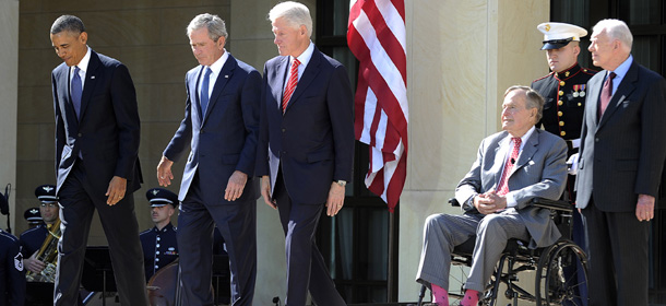 US President Barack Obama (L) and former Presidents (L-R) George W. Bush, Bill Clinton, George H.W. Bush and Jimmy Carter arrive on stage for the George W. Bush Presidential Center dedication ceremony in Dallas, Texas, on April 25, 2013. AFP PHOTO/Jewel Samad (Photo credit should read JEWEL SAMAD/AFP/Getty Images)