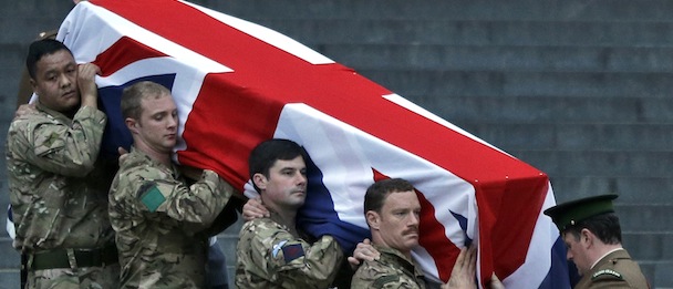 British forces' officer carry a Union Jack draped coffin outside St Paul's Cathedral in central London, early Monday April 15, 2013., during the rehearsal for the upcoming funeral of former British Prime Minister Margaret Thatcher.Thatcher, the combative "Iron Lady" who infuriated European allies and transformed her country by a ruthless dedication to free markets in 11 bruising years as prime minister, died Monday, April 8, 2013. She was 87 and the funeral will take place Wednesday, April 17, 2013. (AP Photo/Lefteris Pitarakis)