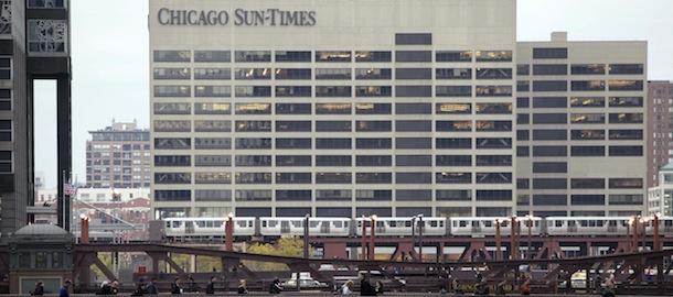 FILE - This Oct. 26, 2009 file photo shows the the Chicago Sun-Times building in Chicago. Sun-Times Media released a statement Thursday, May 30, 2013, to The Associated Press confirming it had laid off its entire full-time photography staff. (AP Photo/Kiichiro Sato, File)