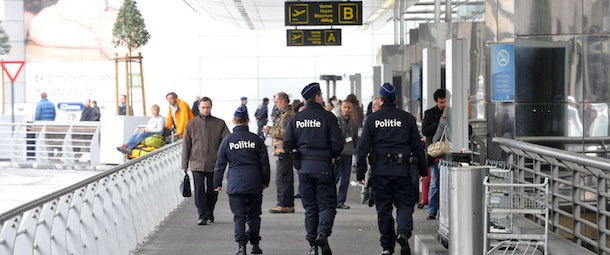 Belgian police officers are on patrol outside the Brussels Airport terminal, in Zaventem, on December 28, 2009. Security at airports around the world has been tightened after a Nigerian man Umar Farouk Abdulmutallab attempted to explode a powder on board of an airplane flying from Amsterdam to Detroit, last Thursday. On Sunday there was another minor incident on the same route.
AFP PHOTO BELGA MARC GYSENS**BELGIUM-OUT** (Photo credit should read MARC GYSENS/AFP/Getty Images)