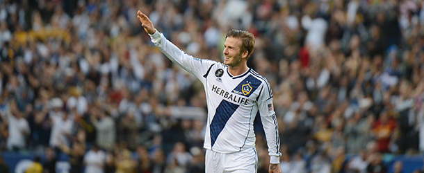 David Beckham waves to fans as he walks off the pitch after the Los Angeles Galaxy defeat the Huston Dynamo in the Major League Soccer (MLS) Cup, December 1, 2012 in Carson, California. It was Beckham's last game with the Galaxy. AFP PHOTO / Robyn Beck (Photo credit should read ROBYN BECK/AFP/Getty Images)