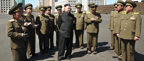 This photo taken on May 1, 2013 and released by North Korea's official Korean Central News Agency (KCNA) on May 2, 2013 shows North Korean leader Kim Jong-Un (C) visiting the Ministry of People's Security to congratulate the people's security persons and service personnel of the Korean People's Internal Security Forces (KPISF) on May Day. THIS PICTURE WAS MADE AVAILABLE BY A THIRD PARTY -- AFP CAN NOT INDEPENDENTLY VERIFY THE AUTHENTICITY, LOCATION, DATE, AND CONTENT OF THIS IMAGE THIS PHOTO IS DISTRIBUTED EXACTLY AS RECEIVED BY AFP -- AFP PHOTO / KCNA via KNS RESTRICTED TO EDITORIAL USE - MANDATORY CREDIT " AFP PHOTO / KCNA via KNS " - NO MARKETING NO ADVERTISING CAMPAIGNS - DISTRIBUTED AS A SERVICE TO CLIENTS (Photo credit should read KCNA VIA KNS/AFP/Getty Images)