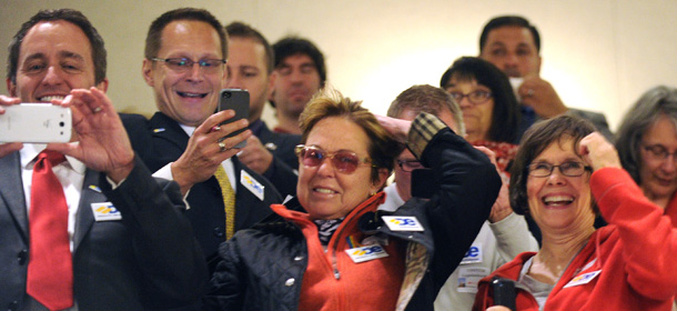 Supporters of Delaware's same-sex marriage bill celebrate in the balcony of the State Senate after the bill's passage in Dover, Del., Tuesday, May 7, 2013. Delaware became the 11th state in the nation to allow same-sex marriage when Democratic Gov. Jack Markell signed a gay marriage bill into law just minutes after its passage by the state Senate on Tuesday. (AP Photo/The Wilmington News-Journal, Gary Emeigh)