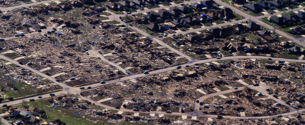 MOORE, OK - MAY 21: An aerial view of destroyed houses and buildings on May 21, 2013 in Moore, Oklahoma. The town reported a tornado of at least EF4 strength and two miles wide that touched down yesterday killing at least 24 people and leveling everything in its path. U.S. President Barack Obama promised federal aid to supplement state and local recovery efforts. (Photo by Benjamin Krain/Getty Images)