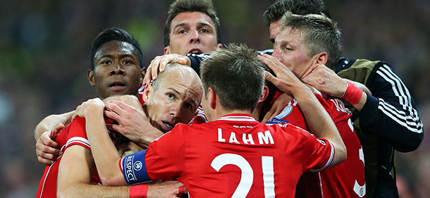 LONDON, ENGLAND - MAY 25: Arjen Robben of Bayern Muenchen (L) celebrates with team-mate Philipp Lahm after scoring a goal during the UEFA Champions League final match between Borussia Dortmund and FC Bayern Muenchen at Wembley Stadium on May 25, 2013 in London, United Kingdom. (Photo by Alex Livesey/Getty Images)