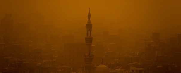 A mosque is seen through the haze of a sand storm, in Cairo, Egypt, Monday, May 13, 2013. A sandstorm hit the capital city of Cairo causing traffic with severely reduced visibility caused by the sand. (AP Photo/Hassan Ammar)