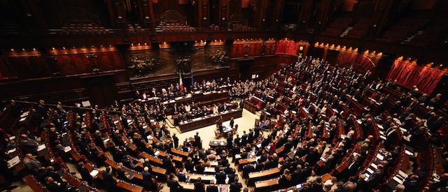 Deputies take place for a vote to adopt measures promised by Italian Prime Minister Silvio Berlusconi to the European Union on November 12, 2011 at the parliament in Rome. Prime Minister Silvio Berlusconi was set to resign later in the day after dominating Italian political life for 17 years, as lawmakers prepared to give final approval to a package of key economic reforms. AFP PHOTO / FILIPPO MONTEFORTE (Photo credit should read FILIPPO MONTEFORTE/AFP/Getty Images)
