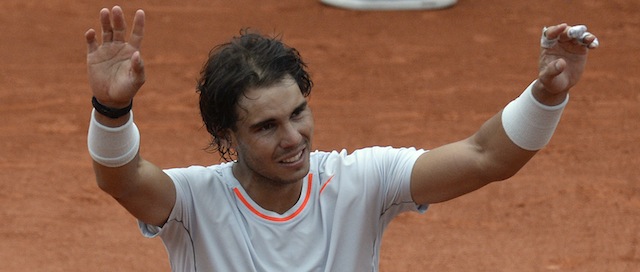 Spain's Rafael Nadal celebrates his victory over Spain's David Ferrer at the end of their French tennis Open final match at the Roland Garros stadium in Paris on June 9, 2013. AFP PHOTO / MARTIN BUREAU (Photo credit should read MARTIN BUREAU/AFP/Getty Images)