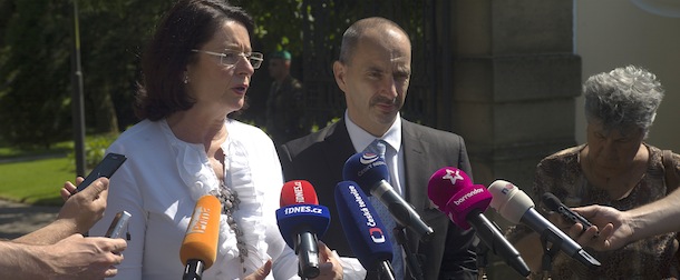 Deputy chairman of Czech Civic democrat party (ODS) Martin Kuba (R) and ODS candidate for prime minister Miroslava Nemcova answer to journalists' questions after their meeting with Czech President Milos Zeman at the Presidential residence Lany Chateau on June 21, 2013, 40km far from Prague . Czech President Milos Zeman started talks with political leaders Friday to find a new prime minister after a corruption scandal toppled the government, with a snap election still possible. AFP PHOTO / MICHAL CIZEK (Photo credit should read MICHAL CIZEK/AFP/Getty Images)