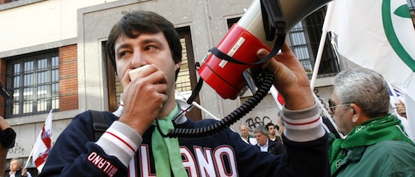 Matteo Salvini talks on a megaphone as the Northern league party staged a protest in front of the "Nagib Mahfuz" school, in Milan, Italy, Tuesday, Oct.10, 2006. (Photo/Luca Bruno)