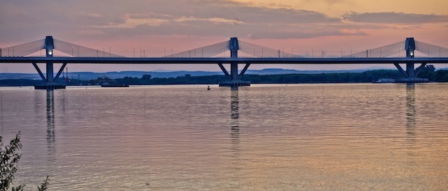 The new Danube bridge is seen at sunset from the Romanian side, Friday, June 14, 2013. The bridge linking Bulgaria and Romania across the Danube River was opened Friday with hopes that it will spur growth in one of Europe's poorest regions.(AP Photo/Andreea Alexandru/Mediafax) ROMANIA OUT
