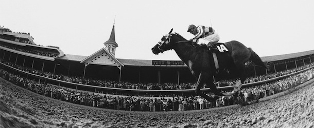 This is a fish-eye lens view of super horse Secretariat, ridden by Ron Turcotte, thunders past the packed clubhouse and track side at Churchill Downs, Louisville, to win the 1973 Kentucky Derby on May 5, 1973. This classic race is perhaps the most exciting two minutes in sports. There are longer, richer races, but the fame of the "Run for the Roses" lies more in the folklore that has grown up around it than in its longevity, distance or purse. (AP Photo)