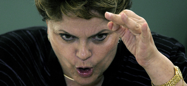 President Dilma Rousseff delivers a speech during a cerimony with the former president Luiz Inacio Lula da Silva (not in frame), at Planalto Palace, Brasilia, Brazil, on January 24, 2012. Lula is treating a larynx cancer and that's the first time he takes part in a official ceremony in the government palace after he left the brazilian presidency. AFP PHOTO/PEDRO LADEIRA (Photo credit should read PEDRO LADEIRA/AFP/Getty Images)