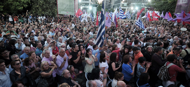 Supporters of the main opposition Syriza party chant gather on June 17, 2013 on the central Syntagma Square in Athens during a rally to demand early elections. Prime Minister Antonis Samaras held an emergency meeting with his coalition allies on June 17 as a furore over the shock shutdown of state broadcaster ERT threatened to bring down the government. Greece's top administrative court on June 17 "temporarily" cancelled the government's shock decision to close state broadcaster ERT, ordering its reopening until a new national media body can be set up. AFP PHOTO / LOUISA GOULIAMAKI (Photo credit should read LOUISA GOULIAMAKI/AFP/Getty Images)