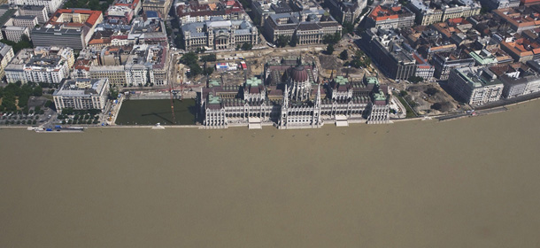 Aerial view of the rising water of the flooding River Danube approaching the Parliament building, centre, in Budapest, Hungary, Friday, June 7, 2013. A record level of flooding of Danube is expected on this and lower sections of the river in Hungary within a few days. (AP Photo/MTI, Sandor Ujvari)