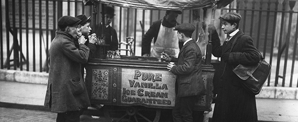 30th January 1912: A man selling ice-cream at Saint Clements Dane Church, during frosty weather. (Photo by Topical Press Agency/Getty Images)