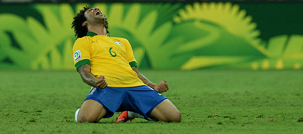 Brazil's defender Marcelo celebrates after defeating Uruguay in their FIFA Confederations Cup Brazil 2013 semifinal football match, at the Mineirao Stadium in Belo Horizonte on June 26, 2013. AFP PHOTO / VANDERLEI ALMEIDA (Photo credit should read VANDERLEI ALMEIDA/AFP/Getty Images)