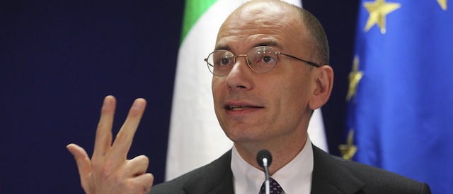 Italian Prime Minister Enrico Letta gestures while speaking during a media conference at an EU summit in Brussels on Friday, June 28, 2013. After late night budget talks, European Union leaders are turning their attention away from their financial troubles Friday and toward embracing once-troubled Balkan countries. (AP Photo/Yves Logghe)