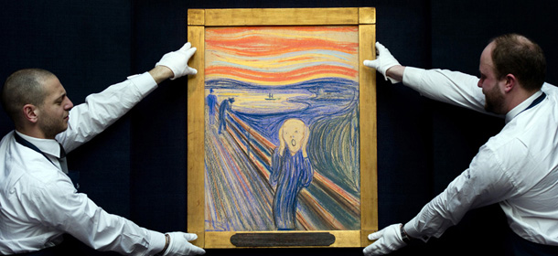 Sotheby's employees pose with Norwegian artist Edvard Munch's 1895 pastel on board version of 'The Scream' at Sotheby's auction house in central London on April 12, 2012. The work is expected to fetch around 80 million USD (around 50 million GBP) when it is auctioned at the Impressionist and Modern Art Evening sale in New York on May 2, 2012. AFP PHOTO / CARL COURT (Photo credit should read CARL COURT/AFP/Getty Images)
