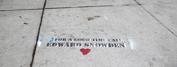 SAN FRANCISCO, CA - JUNE 11: Graffiti that is sympathetic to NSA leaker Edward Snowden is seen stenciled on the sidewalk on June 11, 2013 in San Francisco, California. Edward Snowden, 29, a former contractor for the NSA who worked for the consulting firm Booz Allen Hamilton, recently leaked details about previously unknown U.S. surveillance programs. (Photo by Justin Sullivan/Getty Images)