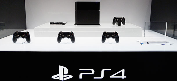LOS ANGELES, CA - JUNE 11: A Playstation 4 and its controllers on display at the Sony Playstation E3 2013 booth at the Los Angeles Convention Center on June 11, 2013 in Los Angeles, California. Thousands are expected to attend the annual three-day convention to see the latest games and announcements from the gaming industry. (Photo by Kevork Djansezian/Getty Images)