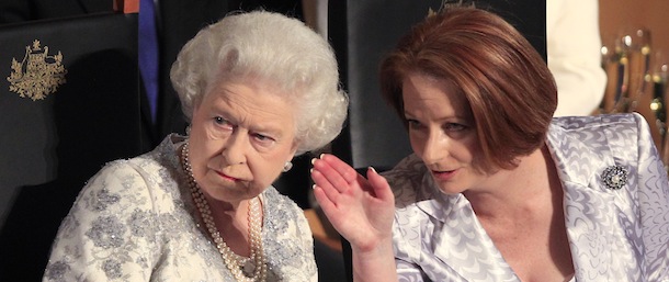Australia's Prime Minister Julia Gillard, right, directs the attention of Queen Elizabeth II during a reception at Parliament House in Canberra, Friday, Oct. 21, 2011. The Queen is on her first visit to Australia since 2006. (AP Photo/Rick Rycroft)