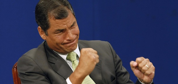 Ecuador's President Rafael Correa celebrates after listening favorable reports about a referendum he proposed as he is interviewed during a TV broadcast at GamaTV station in Quito, Ecuador, Saturday, May 7, 2011. An exit poll indicates Ecuador's voters have roundly approved 10 ballot questions proposed by Correa that critics say could inhibit press freedom and lessen the judiciary's independence. (AP Photo/Dolores Ochoa)