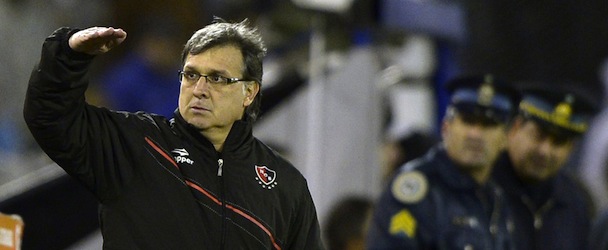 Coach Gerardo Martino of Argentinian Newell's Old Boys' gestures during the Copa Libertadores 2013 football match against Argentinian Velez Sarsfield at Jose Amalfitani stadium in Buenos Aires, Argentina, on May 15, 2013. AFP PHOTO / Juan Mabromata (Photo credit should read JUAN MABROMATA/AFP/Getty Images)