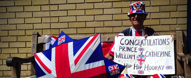 Royal well-wisher Terry Hutt poses for a picture as he waits outside the Lindo Wing of Saint Mary's Hospital in London, on July 12, 2013, where Prince William and his wife Catherine's baby will be born. Britain's royal family and the world's media are on tenterhooks awaiting the birth of Prince William and wife Catherine's first child, a baby who will one day be king or queen of Britain and a diverse group of commonwealth countries. AFP PHOTO / CARL COURT (Photo credit should read CARL COURT/AFP/Getty Images)
