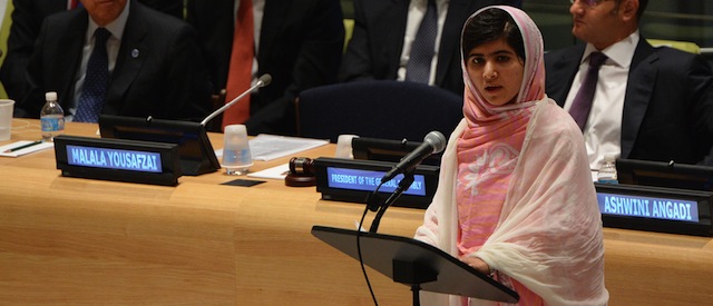 Pakistani student Malala Yousafzai speaks before the United Nations Youth Assembly July 12, 2013 at UN headquarters in New York as UN Secretary General Ban Ki-Moon (L) and Vuk Jeremic (R), President of the UN General Assembly listen. Yousafzai became a public figure when she was shot by the Taliban while travelling to school last year in Pakistan -- targeted because of her committed campaigning for the right of all girls to an education. The UN has declared July 12 "Malala Day", which is also Yousafzai's birthday, and will host the UN Youth Assembly. AFP PHOTO/Stan HONDA (Photo credit should read STAN HONDA/AFP/Getty Images)