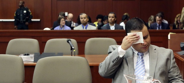 George Zimmerman wipes his brow before the start of court during his trial in Seminole circuit court in Sanford, Fla. Thursday, July 11, 2013. Zimmerman has been charged with second-degree murder for the 2012 shooting death of Trayvon Martin. (AP Photo/Orlando Sentinel, Gary W. Green, Pool)