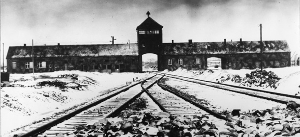 Entry to the concentration camp Auschwitz-Birkenau, Poland, with snow covered railtracks leading to the camp in February/March 1945. The Auschwitz-Birkenau camp was the largest camp where people were terminated during the fascist regime rule of dictator Adolf Hitler over Germany during WWII. (AP Photo/Stanislaw Mucha)