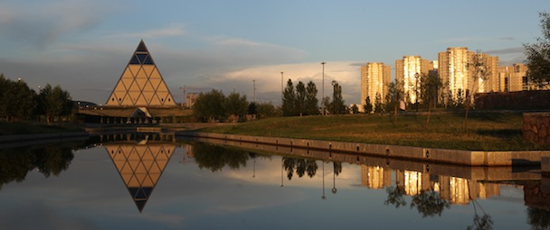 The Palace of Peace and Consent, left, in Astana, Kazakhstan's capital on Friday, July 5, 2013. (AP Photo/ Pavel Mikheyev)