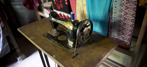 This May 22, 2013 photo shows the first sewing machine owned by Rabeya Begum Laisu, a garment worker from Tekani village in Bangladeshís far northwest. Her older brother bought her the machine when she showed a talent for needlework. Laisu later left to work in the factories of Dhaka, eventually getting a job at Rana Plaza, where the 28-year-old was killed when the building collapsed. Her family still uses the machine, but they are adamant that no relative will ever work in a garment factory again. (AP Photo/Ismail Ferdous)