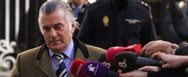 Former PP (Popular Party)'s treasurer Luis Barcenas passes by journalists' microphones as he leaves the anti-corruption prosecuting office in Madrid after being questionned about undeclared salaries's case on February 6, 2013. Prosecutors questioned Barcenas today over allegations of corrupt payments implicating Prime Minister Mariano Rajoy. AFP PHOTO/ PIERRE-PHILIPPE MARCOU (Photo credit should read PIERRE-PHILIPPE MARCOU/AFP/Getty Images)