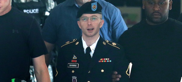 FORT MEADE, MD - JULY 30: U.S. Army Private First Class Bradley Manning (C) is escorted by military police as he leaves his military trial after he was found guilty of 20 out of 21 charges, July 30, 2013 Fort George G. Meade, Maryland. Manning, was found not guilty of aiding the enemy, was convicted of wrongfully causing intelligence to be published on the internet, is accused of sending hundreds of thousands of classified Iraq and Afghanistan war logs and more than 250,000 diplomatic cables to the website WikiLeaks while he was working as an intelligence analyst in Baghdad in 2009 and 2010. (Photo by Mark Wilson/Getty Images)