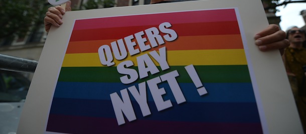 Protesters hold a demonstration against Russian anti-gay legislation and against Russian President Vladimir Putin stands on gay rights, in front of the Russian Consulate in New York, July 31, 2013. Protesters called for a boycott of Russian products and ask the Russian government to repeal the anti-gay propaganda law before the 2014 Winter Olympics in Sochi. AFP PHOTO/Emmanuel Dunand (Photo credit should read EMMANUEL DUNAND/AFP/Getty Images)