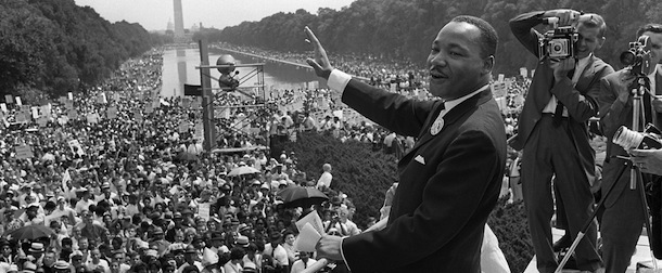 (FILES) US civil rights leader Martin Luther KIng (C) waves to supporters from the steps of the Lincoln Memorial 28 August 1963 on the Mall in Washington DC (Washington Monument in background) during the "March on Washington". 28 August marks the 40th anniversary of the famous "I Have a Dream" speech, which is credited with mobilizing supporters of desegregation and prompted the 1964 Civil Rights Act. Martin Luther King was assassinated on 04 April 1968 in Memphis, Tennessee. James Earl Ray confessed to shooting King and was sentenced to 99 years in prison. AFP PHOTO/FILES (Photo credit should read -/AFP/Getty Images)
