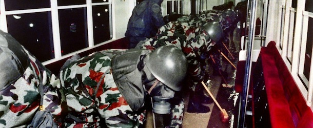 Wearing gas masks, members of the Japan Ground Self-Defense Forces clean up subway cars late March 20, 1995 in Tokyo. Aum sect attackers unleashed Sarin nerve gas in the Tokyo metro system during rush hour killing twelve people and injuring more than 5000 others. (Photo credit should read -/AFP/Getty Images)