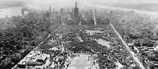 This aerial view shows two-thirds of Central Park's 40 acres, looking south toward the tip of Manhattan, on Aug. 26, 1957. In the foreground is part of the billion-gallon reservoir, and the open space above contains six baseball diamonds. At left along Fifth Ave., is the Metropolitan Museum of Art. The tall skyscraper in the center is the Empire State Building. (AP Photo)