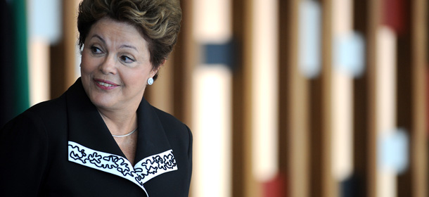 Brazilian President Dilma Rousseff gestures during the first official ceremony to deliver credentials to foreign ambassadors of the year, at Itamaraty Palace, in Brasilia on January 23, 2013. AFP PHOTO/Pedro LADEIRA (Photo credit should read PEDRO LADEIRA/AFP/Getty Images)