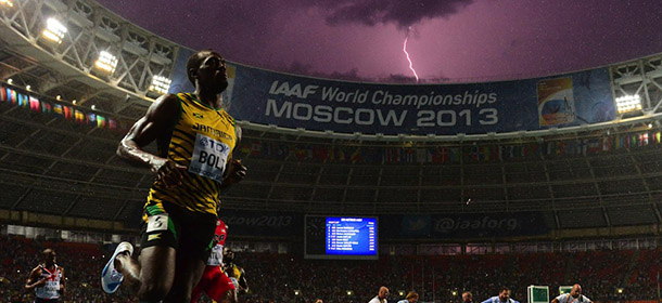 Jamaica's Usain Bolt wins the 100 metres final at the 2013 IAAF World Championships at the Luzhniki stadium in Moscow on August 11, 2013. Bolt timed a season's best 9.77 seconds, with American Justin Gatlin claiming silver in 9.85sec and Nesta Carter, also of Jamaica, taking bronze in 9.95sec. 
 AFP PHOTO / OLIVIER MORIN (Photo credit should read OLIVIER MORIN/AFP/Getty Images)